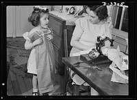 "Can I wear it today?" Attractive playsuits for daughter can be made from that old housedress, the one with the splitting seams, and Junior's first long pants (no cuffs) can emerge from father's old overcoat. With shortages of wool and other materials that are needed by the armed forces, it's wise, mother, to conserve clothing by altering and. Sourced from the Library of Congress.