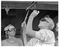 De Land pool. Aircraft construction class. Women are being trained along with men in the Volusia County Florida Vocational School to take their places on the war production front. Susie Nelson, left, has a husband in Panama and a brother in the Navy. Pearl Kinchem, right, is a housewife with a brother in the army. Soon both of them will be welding aircraft in the De Land industrial pool. Sourced from the Library of Congress.