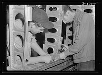 Production. Willow Run bomber plant. The outer wing panel of a bomber undergoes assembly in the giant Willow Run plant. When finished, this section will be removed and cranes will install another section in the fixture. Ford plant, Willow Run. Sourced from the Library of Congress.