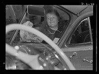 Women in war. Filling station attendant. Tires need checking too? Shifting trends of employment in wartime America have opened up new jobs for such women as this young East Liverpool, Ohio, girl who has pioneered in two new fields since graduation from high school. She learned butchering first, and built up quite a reputation as a purveyor of choice cuts. Now she's one of the most efficient service station attendants in the neighborhood. Her name? Virginia Excell. Sourced from the Library of Congress.