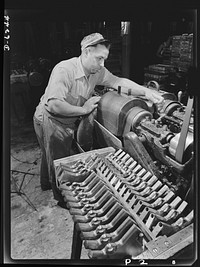 Production. 45-caliberautomatic pistols. Anthony Freda drills the barrels of .45-caliber automatic pistols in the plant of a large manufacturer of firearms. Many men and women are employed in this plant which produces pistols, machine guns, and other essential weapons for the armed forces. Sourced from the Library of Congress.