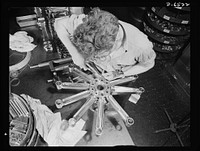 Production. Pratt and Whitney airplane engines. A single-row rod assembly for a Pratt and Whitney airplane engine takes shape in an Eastern war plant now producing at full capacity for our armed forces. Pratt and Whitney Aircraft. Sourced from the Library of Congress.
