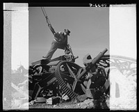 War production drive. Anthracite rallies. How the mines contribute to the nation's scrap pile was demonstrated by an enthusiastic miner during an anthracite rally--one of four held in Eastern Pennsylvania, September 28th through October 1st. Sourced from the Library of Congress.