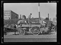 Salvage. Scrap for steel mills. To feed the nation's munitions furnaces, tons of scrap from America's attics and basements are collected every day. Here, a junkman unloads his wagon in a central depot, where the scrap will be segregated and graded for shipment to steel mills. Sourced from the Library of Congress.
