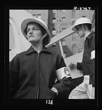 Nurse training. Hospital preparations for possible air raids involve the training of street accident units to increased efficieny. Nurses wear coat and skirt that can be put on over uniform in a jiffy. Sourced from the Library of Congress.