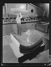 Production. B-17F heavy bomber. A section of the "skin" that fits around the was new B-17F (Flying Fortress) bombers are finished in a hydraulic press at the Boeing plant in Seattle. The Flying Fortress, a four-engine heavy bomber capable of flying at high altitudes, has performed with great credit in the South Pacific, over Germany and elsewhere. Sourced from the Library of Congress.