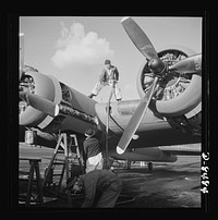 Production. B-17 heavy bomber. Fueling a new B-17F (Flying Fortress) bombers at the airfield of Boeing's Seattle plant. Ships are delivered to the Army and the Navy after they have successfully undergone flight tests. The Flying Fortress has performed with great credit in the South Pacific, over Germany and elsewhere. It is a four-engine heavy bomber capable of flying at high altitudes. Sourced from the Library of Congress.