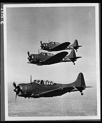 The Douglas A-24 (Dauntless) light dive bomber, is the Army counterpart of the Navy SBD, with certain modifications to meet Army requirements. It was designed for dive-bombing operations against ground troops and installations. It is equipped with slotted diving flaps to decrease air speed and obtain greater accuracy. The Dauntless is more maneuverable than the German Stuka and is capable of carrying heavier bomb loads. Sourced from the Library of Congress.