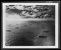 Convoy. Sailing with their sterns to the rising sun, ships of an American convoy set out for the Southwest Pacific. Ships like these and the naval vessels and planes that accompany them are maintaining the "bridges of boats" that link us with our far- flung battle fronts. Sourced from the Library of Congress.