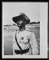 Member of the Order of the British Empire. Decorated for continuous gallantry and devotion to duty while under fire in the East African campaign, Regimental Sergeant Major LIanyier Dagarti of the Gold Coast Regiment, Royal West African Frontier Force, was the first Gold Coast soldier to receive the M.B.E (Member of the Order of the British Empire) in this war. His magnificent example of coolness and courage inspired in his batallion into action at Bulo Erillo and Uodors. Nineteen years in the service he holds Good Conduct and Long Service medals. Sourced from the Library of Congress.