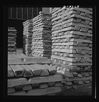 Production. Magnesium. Magnesium, ready for war uses. Production of this lightest of all metals, vitally needed in the United Nations' war effort, is increasing daily at Basic Magnesium's giant plant in the southern Nevada desert. A 24-hour production schedule results in the turning out of thousands of ingots ready for shipment to aircraft and tracer bullet manufacturers. Sourced from the Library of Congress.