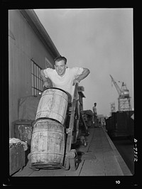 Baseball players in war production. Pitching in to stop the Axis short, shortstop Vernie Stephens, former Saint Louis Browns star, has been a warehouseman for California Ship Building Corporation since early last fall. Sourced from the Library of Congress.