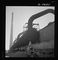 Production. Copper (refining). Copper is recovered from smoke that pours into these pipes from the furnaces of a large refining operation. Large amounts of copper are produced for the war effort at the El Paso, Texas plant of Phelps-Dodge Refining Company. Sourced from the Library of Congress.