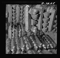 Production. Zinc. Pig lead produced at a large smelting plant. From the Eagle-Picher plant near Cardin, Oklahoma, come great quantities of zinc and lead to serve many important purposes in the war effort. Sourced from the Library of Congress.