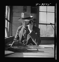 Utah Copper: Bingham Mine. One of the executives who keeps heavy ore production coming from the open-pit mining operations of Utah Copper Company at Bingham Canyon, Utah. Sourced from the Library of Congress.