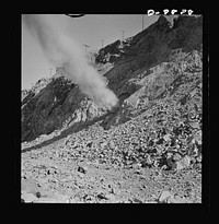Utah Copper: Bingham Mine. Blasting at the open-pit mining operations of Utah Copper Company at Bingham Canyon, Utah. Sourced from the Library of Congress.