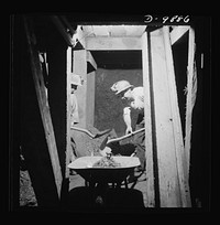 Production. Mercury. Loading mercury ore into a wheelbarrow at the New Idria, California plant. At the New Idria Quicksilver Mining Company plant, triple-distilled mercury is produced from cinnabar, an ore containing sulphur and mercury mined at a number of workings near the plant. Sourced from the Library of Congress.