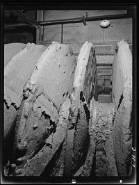 Production. Copper. A closeup of a disc-type filter showing how the dried copper concentrate is broken by expansion of the filter and then discharged. This filter unit is at the Arthur plant of the Utah Copper Company. Sourced from the Library of Congress.