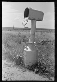 Mail box set up in milk can near Hydro, Oklahoma by Russell Lee
