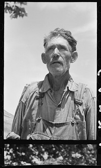 [Untitled photo, possibly related to: Veteran migrant agricultural worker. He has followed the road for about thirty years. When asked where his home was he said, "It's all over." He was camped in Wagoner County, Oklahoma] by Russell Lee