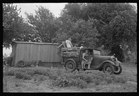 [Untitled photo, possibly related to: Getting ready to depart from home in Oklahoma for the trip to California. Near Muskogee, Oklahoma] by Russell Lee