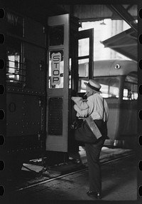 [Untitled photo, possibly related to: People getting off and people waiting to get on streetcar. Terminal, Oklahoma City, Oklahoma] by Russell Lee