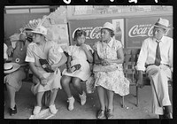 People waiting at streetcar terminal for cars, Oklahoma City, Oklahoma by Russell Lee