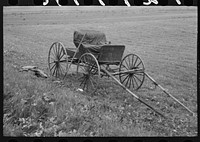 [Untitled photo, possibly related to: Old buggy and pitchfork on farm near Northampton, Massachusetts] by Russell Lee