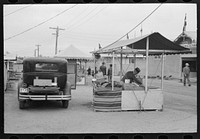 [Untitled photo, possibly related to: Family at Gonzales, Texas, county fair] by Russell Lee