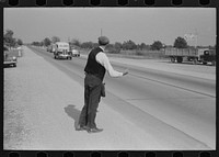 Hitchhiker at city limits of Waco, Texas by Russell Lee