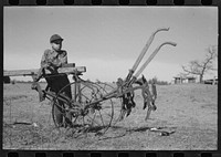 [Untitled photo, possibly related to: Son of Pomp Hall, tenant farmer, going to work the field with a spike tooth harrow, Creek County, Oklahoma. See general caption number 23] by Russell Lee