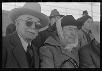 [Untitled photo, possibly related to: Elderly couple at the rodeo during the San Angelo Fat Stock Show, San Angelo, Texas] by Russell Lee