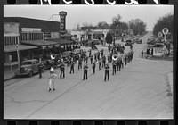 High school band parading down the main street of Eufaula, Oklahoma by Russell Lee