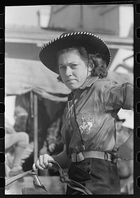 Girl rodeo performer, San Angelo Fat Stock Show, San Angelo, Texas by Russell Lee