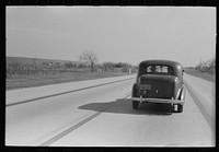 [Untitled photo, possibly related to: Scene on the highway north of San Antonio, Texas, Bexan County] by Russell Lee