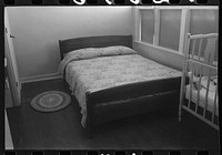 [Untitled photo, possibly related to: Windows in bedroom of family apartment at the Arizona Part-Time Farms, Chandler Unit, Maricopa County, Arizona. Cross ventilation is provided in all bedrooms on this project] by Russell Lee