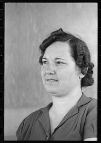 Wife of migratory laborer living at the Agua Fria Migratory Labor Camp, Arizona by Russell Lee