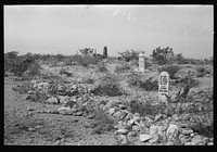Boothill Cemetery, Tombstone, Arizona. It was called Boothill because with one or two exceptions all buried here died unnatural deaths with their boots on by Russell Lee