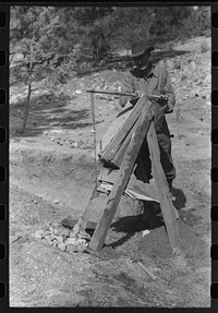 [Untitled photo, possibly related to: Prospector operating the papago. Pinos Altos, New Mexico] by Russell Lee
