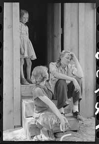 On the front steps, Pie Town, New Mexico by Russell Lee