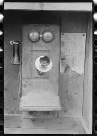 Telephone used for communication between various points in the mine. Mill and office, gold mine at Mogollon, New Mexico by Russell Lee