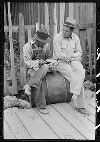 Gold miners talking, Mogollon, New Mexico by Russell Lee