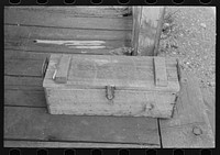 [Untitled photo, possibly related to: Samples of ore and box containing samples of milled tailing solutions which are sent to Silver City. Mogollon, New Mexico] by Russell Lee