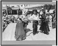 Native Spanish-American dance. Fiesta, Taos, New Mexico by Russell Lee