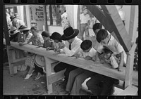 Bingo at fiesta, Taos, New Mexico by Russell Lee