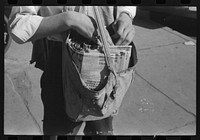 Newsboy's sack of papers, Montrose, Colorado by Russell Lee