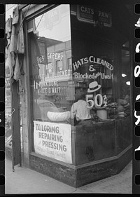 Many es are employed in small enterprises such as this one on the South Side of Chicago, Illinois by Russell Lee