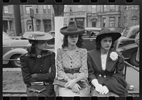 Girls waiting for Episcopal Church to end so they can see the processional, South Side of Chicago, Illinois by Russell Lee