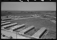 [Untitled photo, possibly related to: Row shelters of farm workers at the FSA (Farm Security Administration) labor camp. Caldwell, Idaho] by Russell Lee