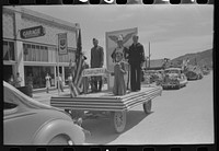 [Untitled photo, possibly related to: Watching the Fourth of July parade. Vale, Oregon] by Russell Lee